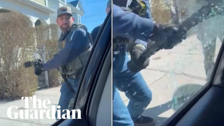 US immigration officers smash car window to detain man