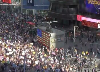 ‘No Kings’ protesters fill Times Square in New York City as thousands join protest against Trump